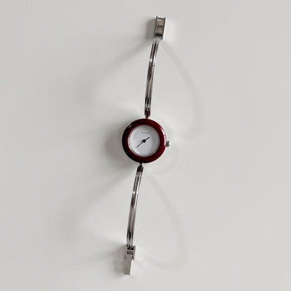 Gucci 1990s Interchangeable Bezel Stainless steel Bangle Watch with 12 bezels, case