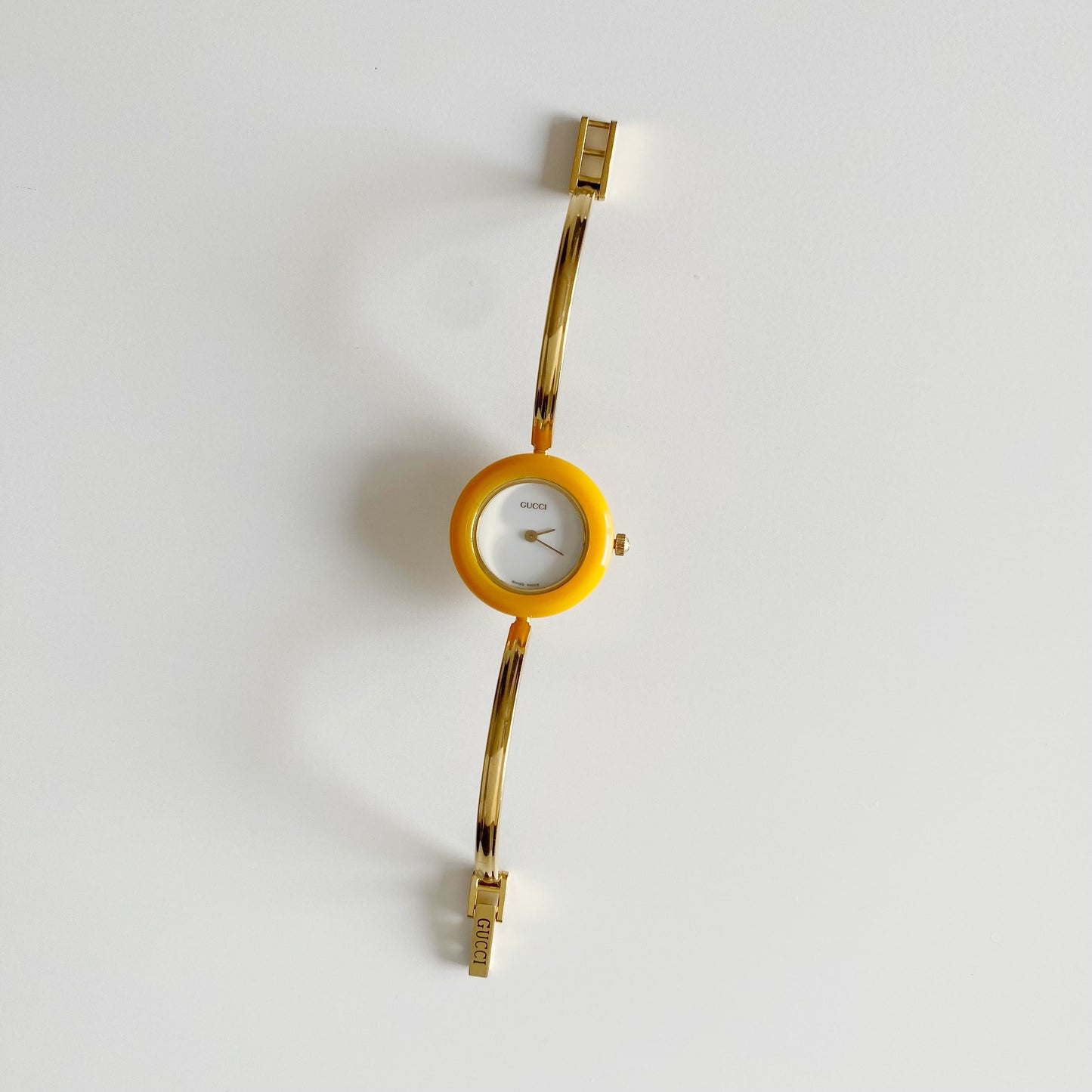 Gucci 1990s Interchangeable Bezel Gold Plated Bangle Watch with 12 bezels, case