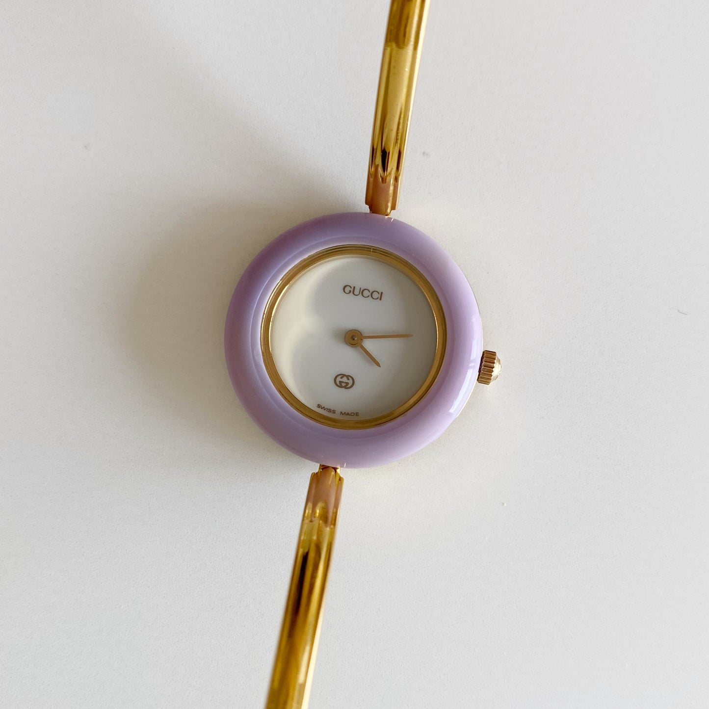 Gucci 1990s Interchangeable Bezel Gold Plated Bangle Watch with 12 bezels, case