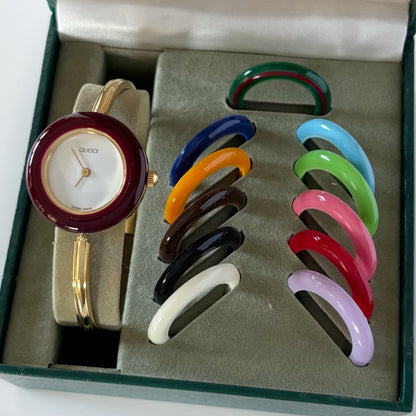 Gucci 1990s Interchangeable Bezel Gold Plated Bangle Watch with 12 bezels, case