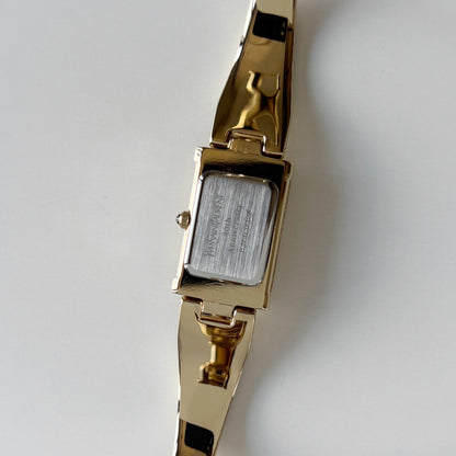 Yves Saint Laurent 1990s Peek-A-Boo Gold Plated Bangle Watch