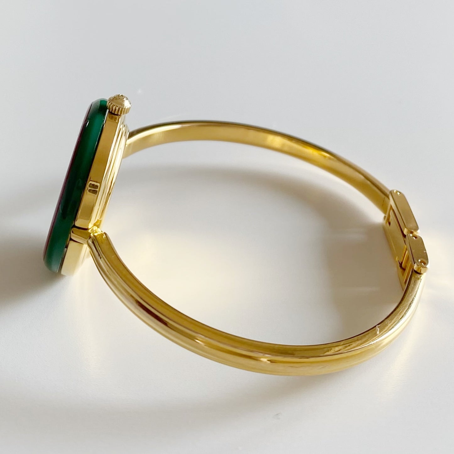 Gucci 1990s Interchangeable Bezel Gold Plated Bangle Watch with 12 bezels, case