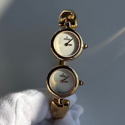 Fendi 1990s Seashell Dial Two Time Zone Gold Plated Bangle Watch
