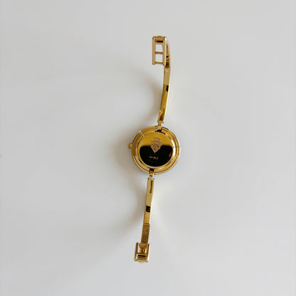 Gucci 1990s Interchangeable Bezel Gold Plated Bangle Watch with 12 bezels, case