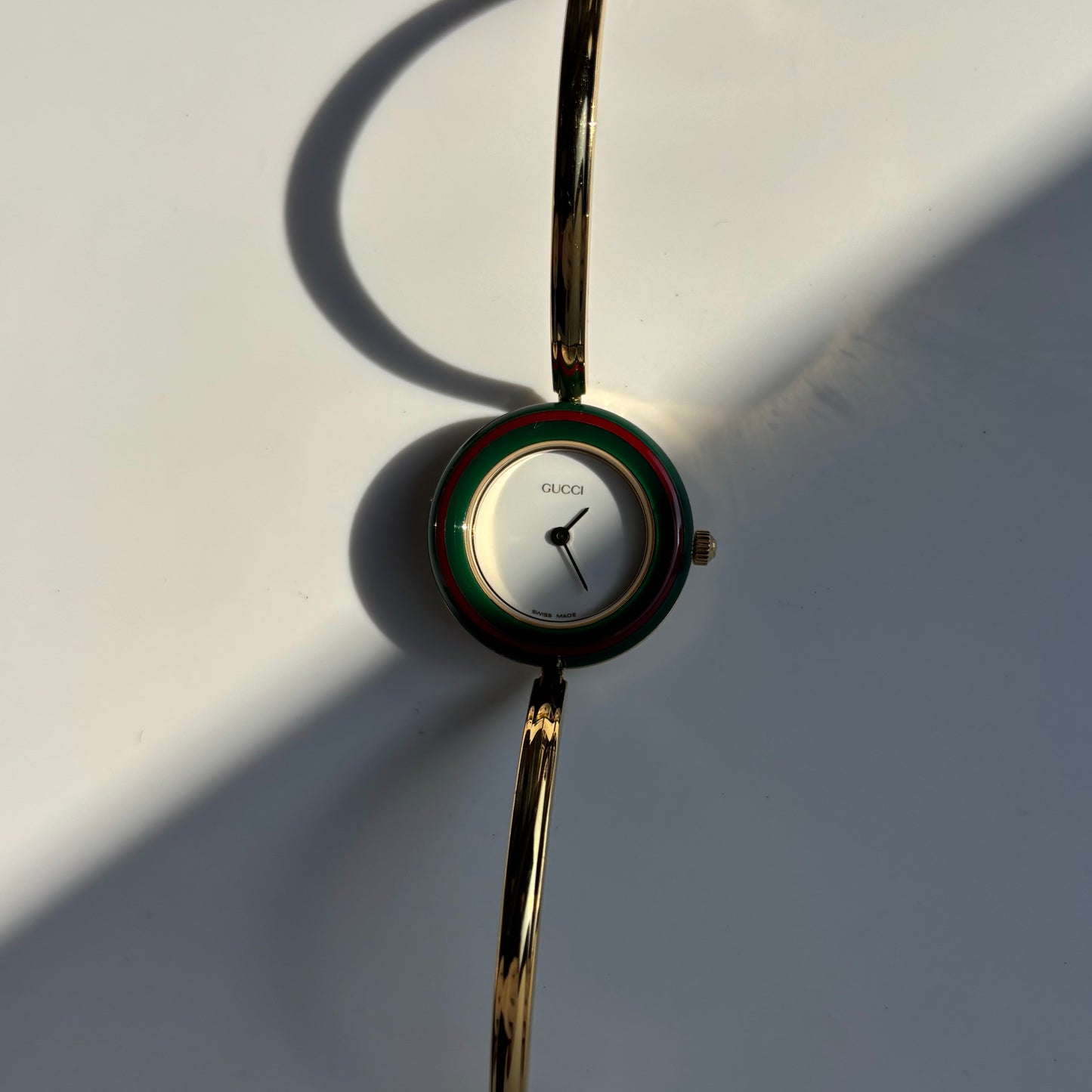 Gucci 1990s Interchangeable Bezel Gold Plated Bangle Watch with 12 bezels, case