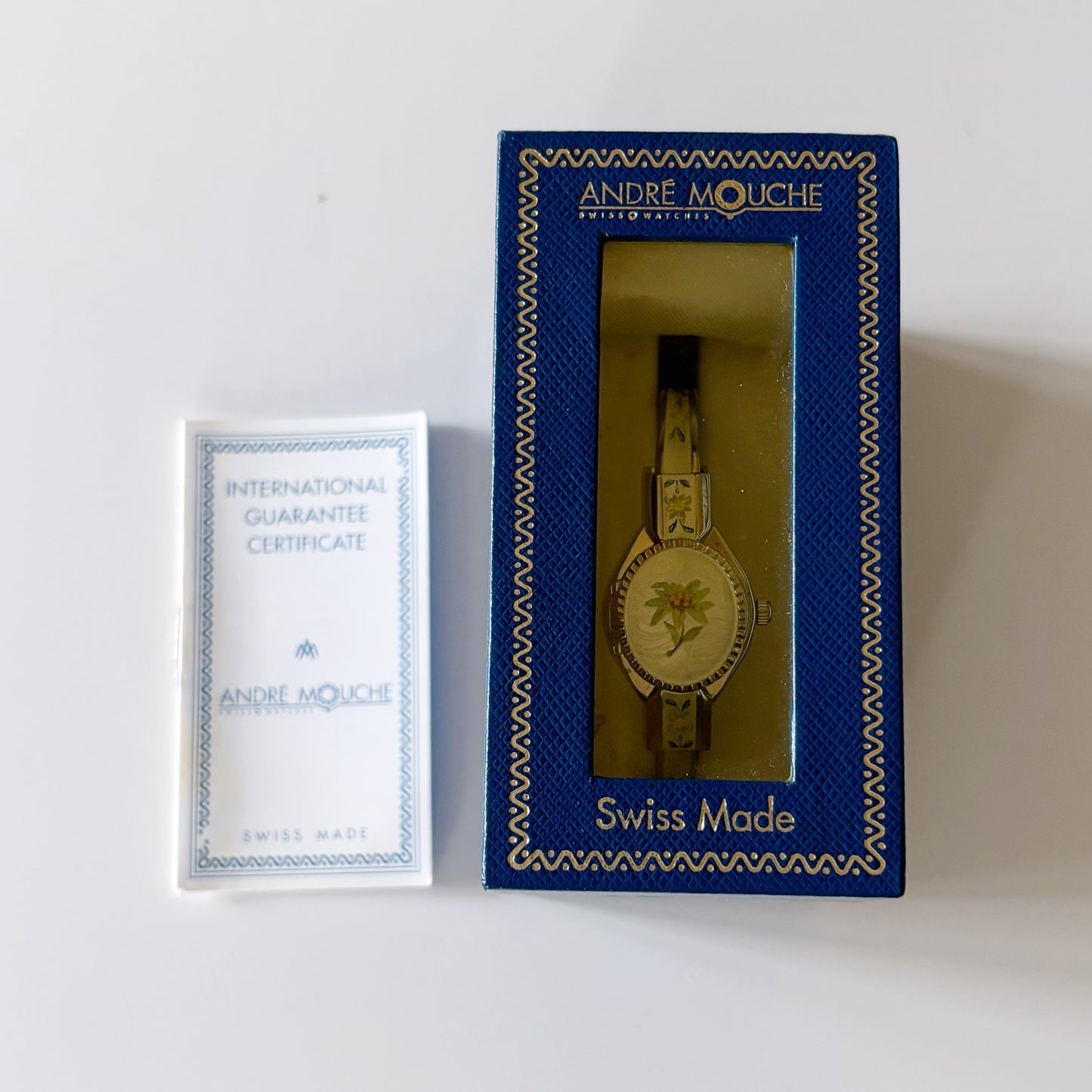 André Mouche Early 2000s Peek-A-Boo Silver Bangle Watch