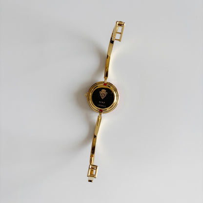 Gucci 1990s Interchangeable Bezel Gold Plated Bangle Watch with 12 bezels, case