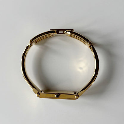 Gucci 1990s Gold Rectangular Dial Gold Plated Bangle Watch (Small)