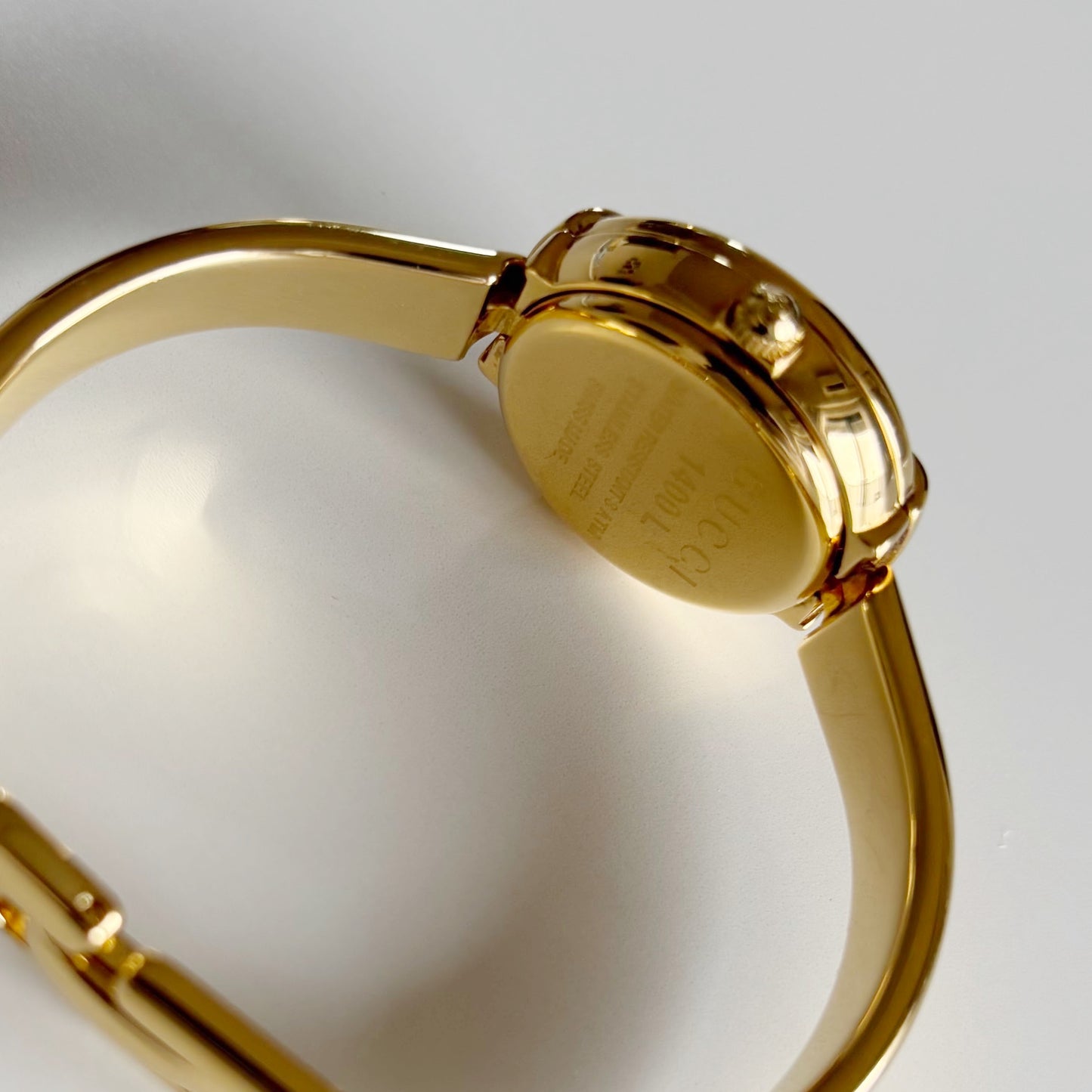 Gucci 1990s Round Dial Gold Plated Bangle Watch (Small)