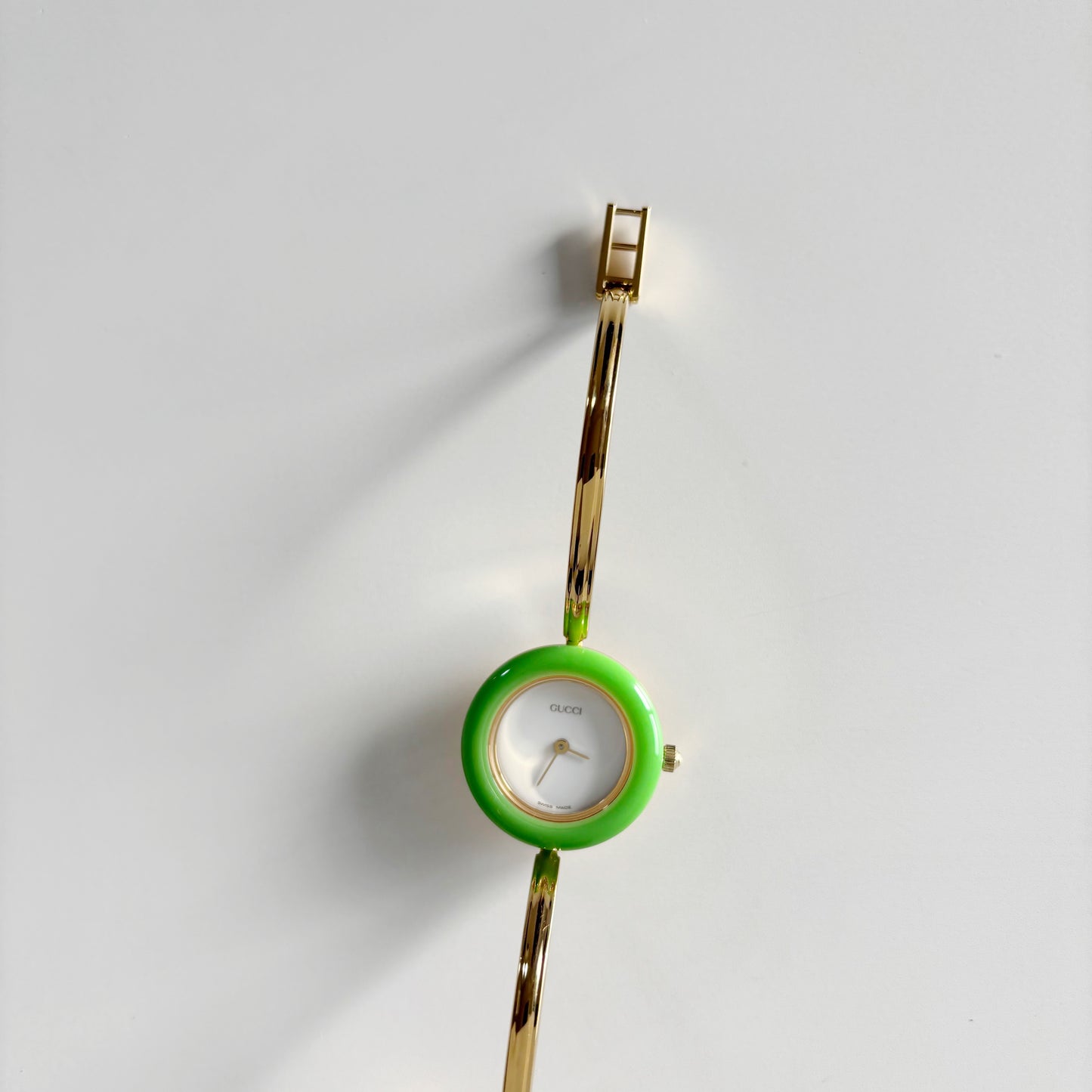 Gucci 1990s Interchangeable Bezel Gold Plated Bangle Watch with 12 bezels, case