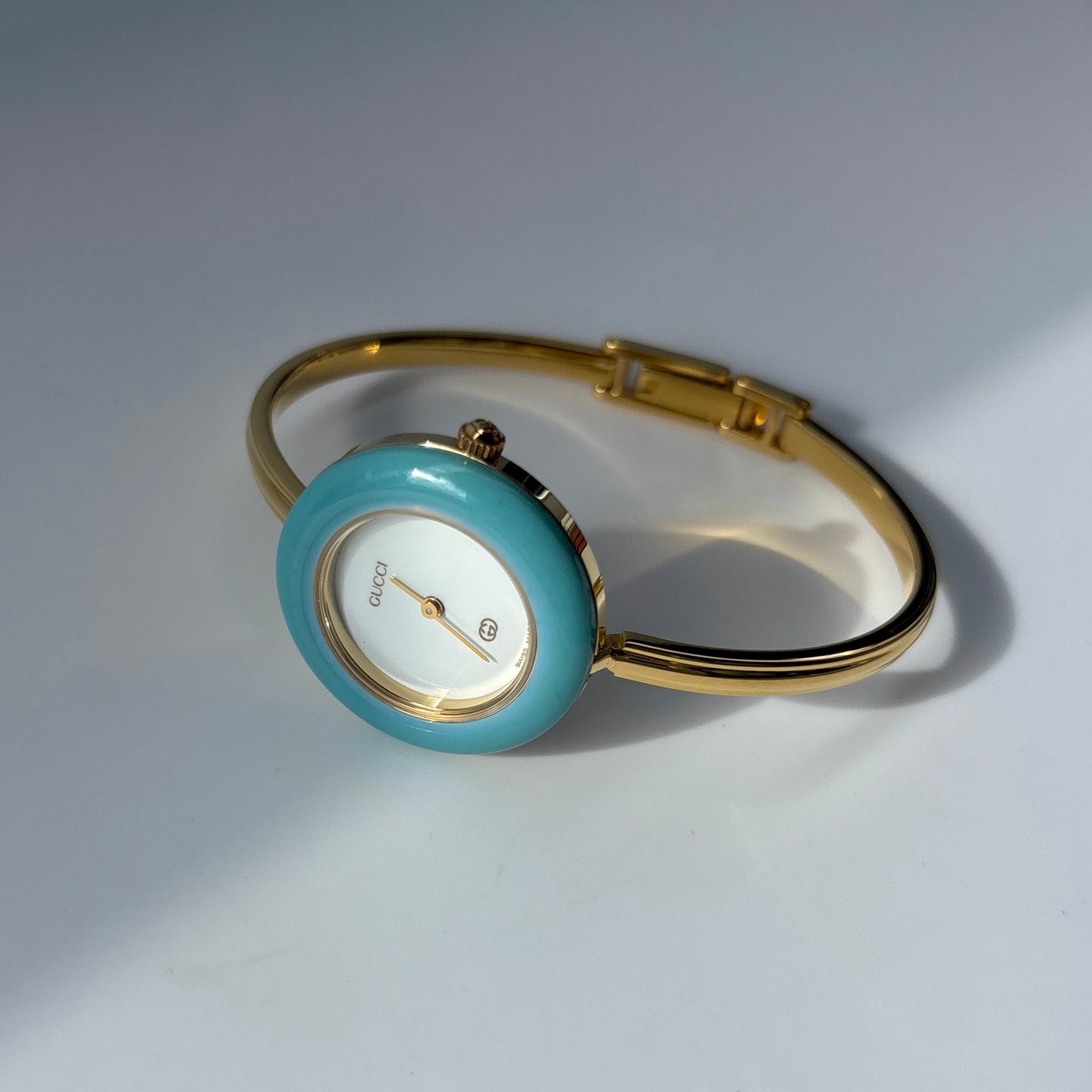 Gucci 1990s Interchangeable Bezel Gold Plated Bangle Watch with 12 bezels, case