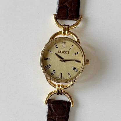 Gucci 1990s Gold Round Dial Horsebit Gold Plated Watch