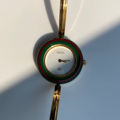 Gucci 1990s Interchangeable Bezel Gold Plated Bangle Watch with 12 bezels, case