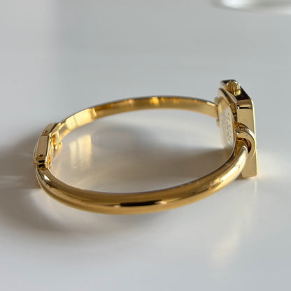 Gucci 1990s Square Dial Gold Plated Bangle Watch