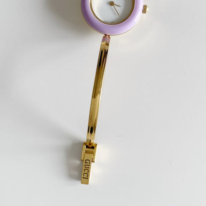 Gucci 1990s Interchangeable Bezel Gold Plated Bangle Watch with 12 bezels, case