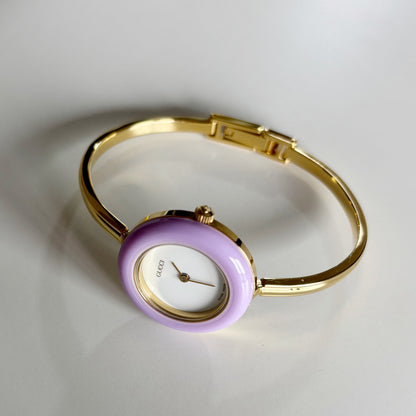 Gucci 1990s Interchangeable Bezel Gold Plated Bangle Watch with 12 bezels, case