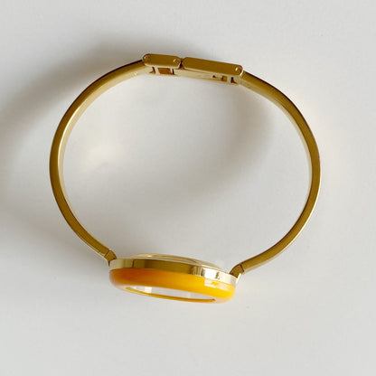 Gucci 1990s Interchangeable Bezel Gold Plated Bangle Watch with 12 bezels, case