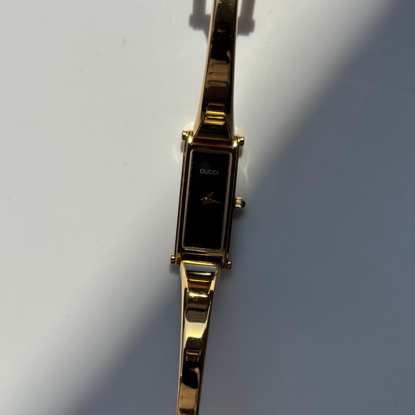 Gucci 1990s Black Dial Gold Plated Bangle Watch