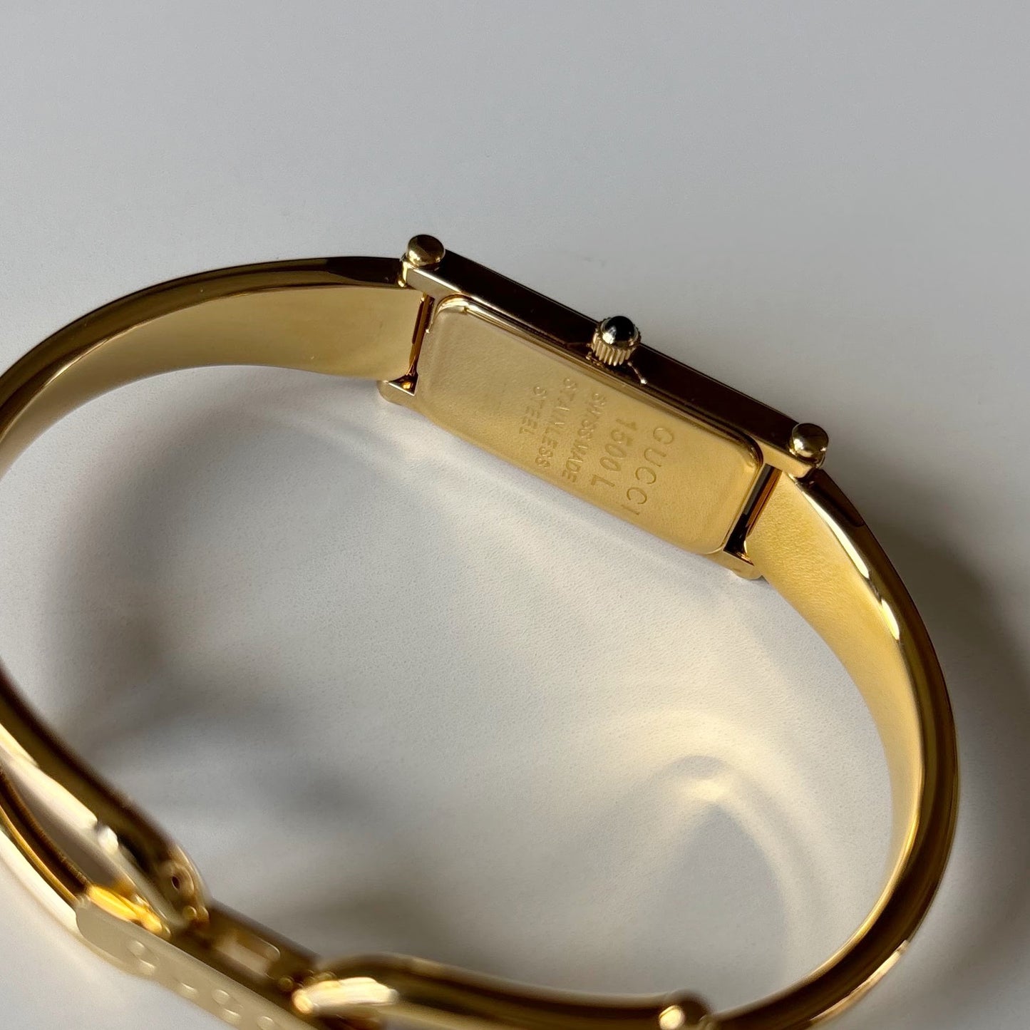 Gucci 1990s Black Rectangular Dial Gold Plated Bangle Watch
