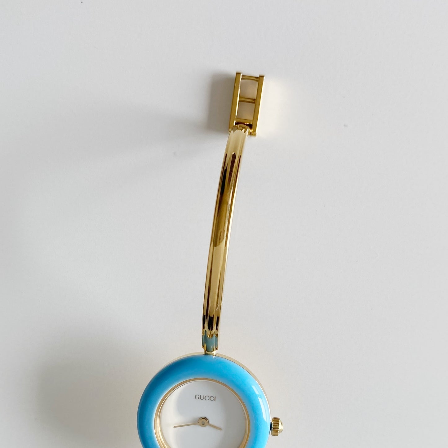 Gucci 1990s Interchangeable Bezel Gold Plated Bangle Watch with 12 bezels, case