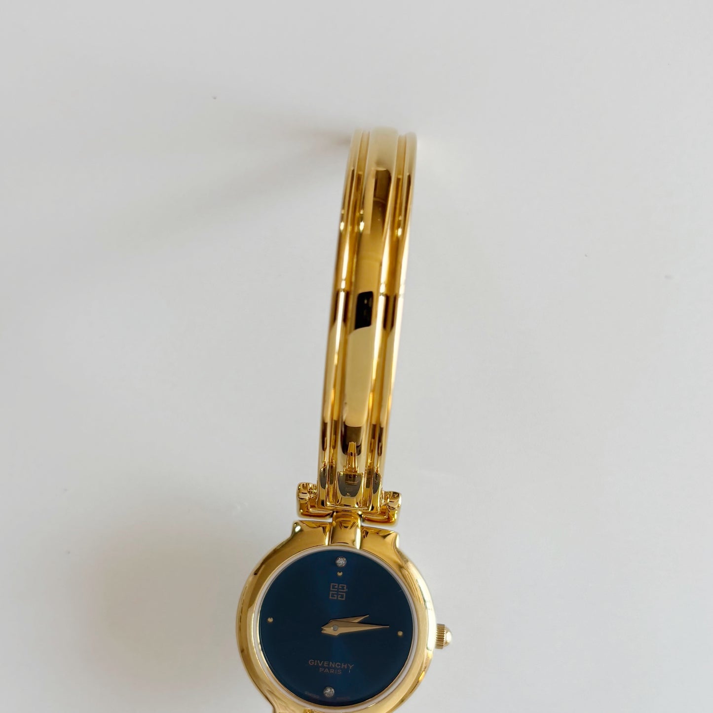 Givenchy 1990s Navy Round Dial Gold Plated Bangle Watch