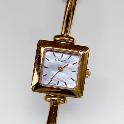 Gucci 1990s Seashell Dial Gold Plated Bangle Watch