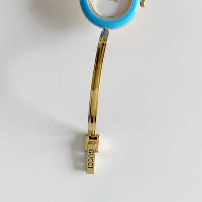 Gucci 1990s Interchangeable Bezel Gold Plated Bangle Watch with 12 bezels, case