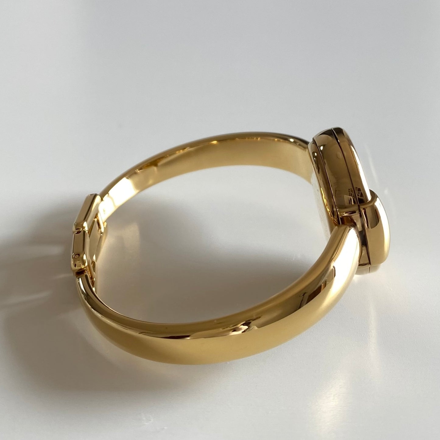 Gucci 1990s Round Dial Gold Plated Bangle Watch