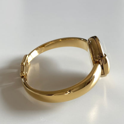 Gucci 1990s Round Dial Gold Plated Bangle Watch