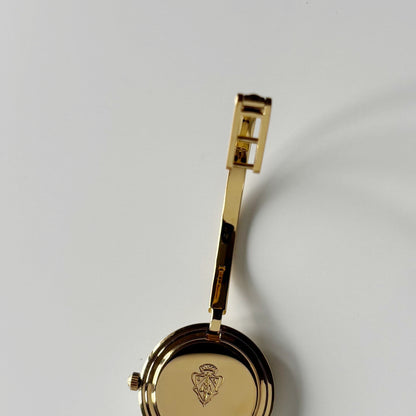 Gucci 1990s Interchangeable Bezel Gold Plated Bangle Watch with 12 bezels, case