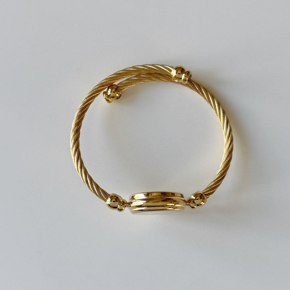 Gucci 1990s Black Round Dial Cable Gold-Plated Bangle Watch