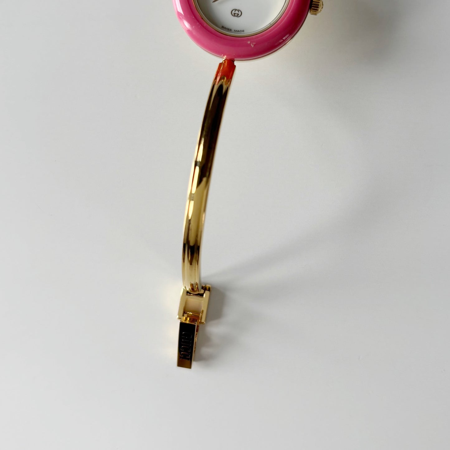 Gucci 1990s Interchangeable Bezel Gold Plated Bangle Watch with 12 bezels, case