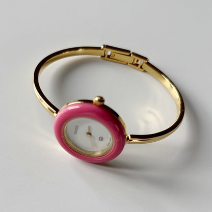 Gucci 1990s Interchangeable Bezel Gold Plated Bangle Watch with 12 bezels, case