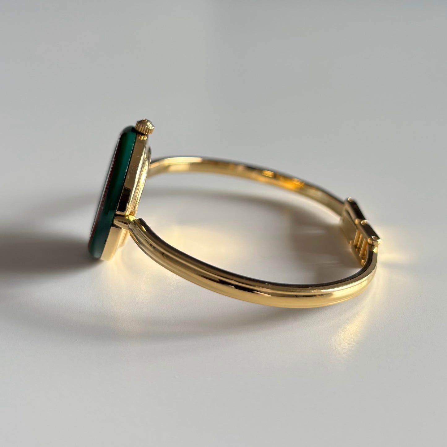 Gucci 1990s Interchangeable Bezel Gold Plated Bangle Watch with 12 bezels, case