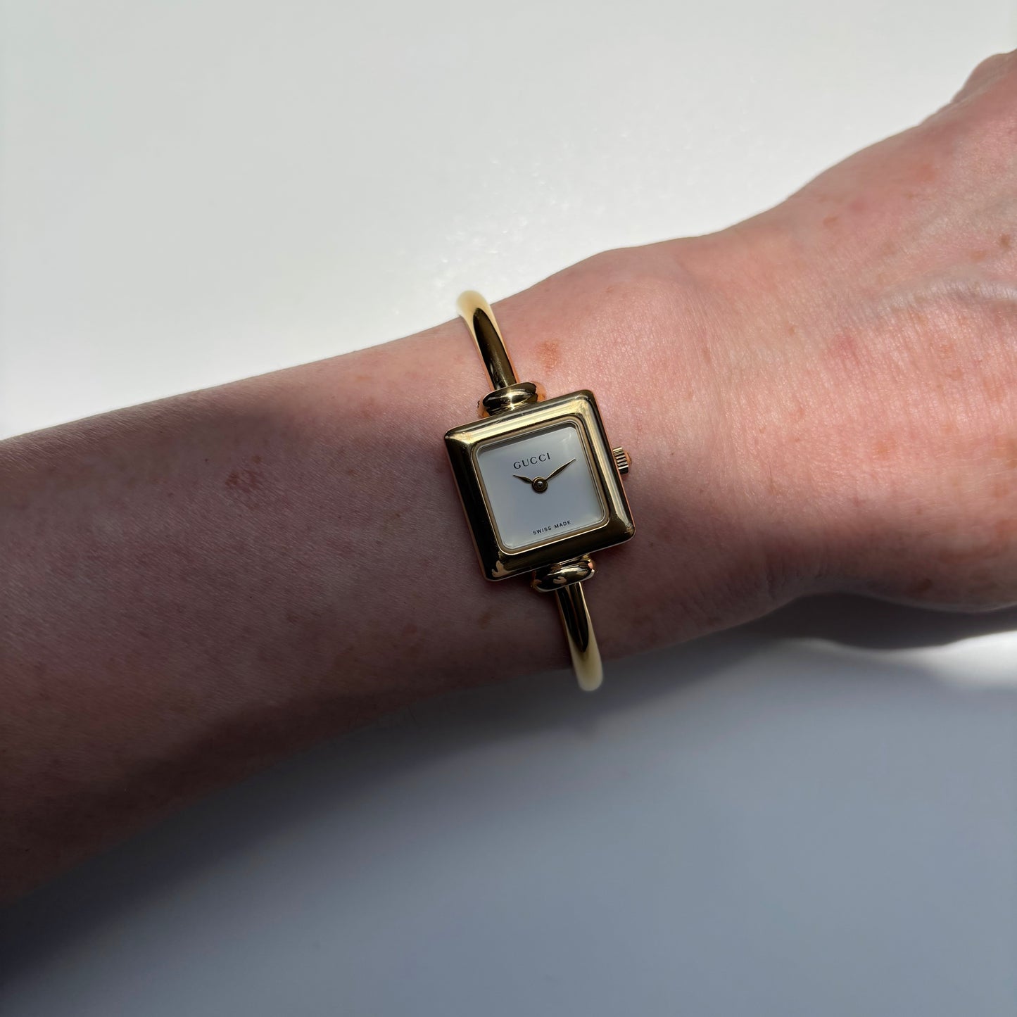 Gucci 1990s Square Dial Gold Plated Bangle Watch