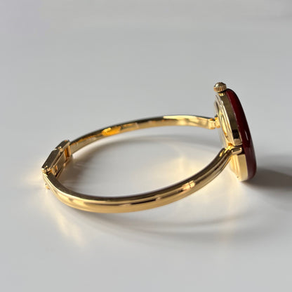 Gucci 1990s Interchangeable Bezel Gold Plated Bangle Watch with 12 bezels, case