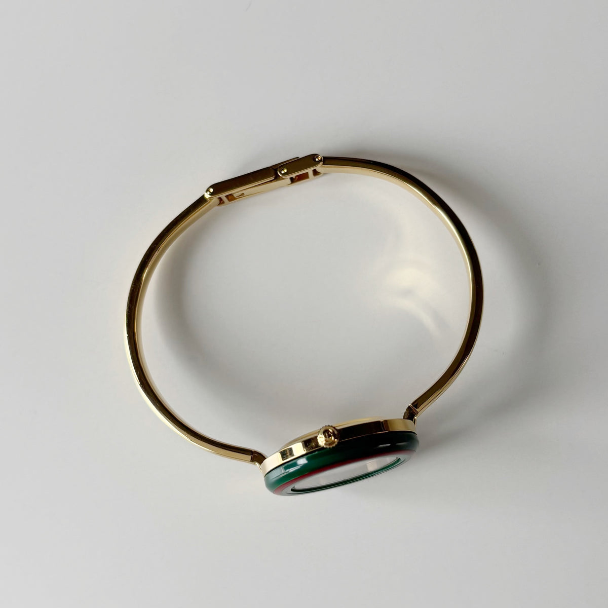 Gucci 1990s Interchangeable Bezel Gold Plated Bangle Watch with 12 bezels, case