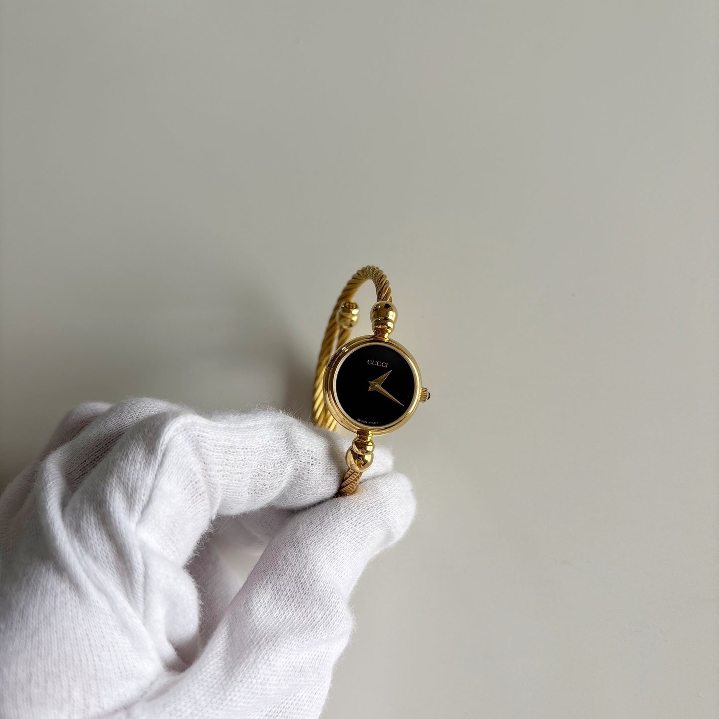 Gucci 1990s Black Dial Gold Plated Cable Band Bangle Watch