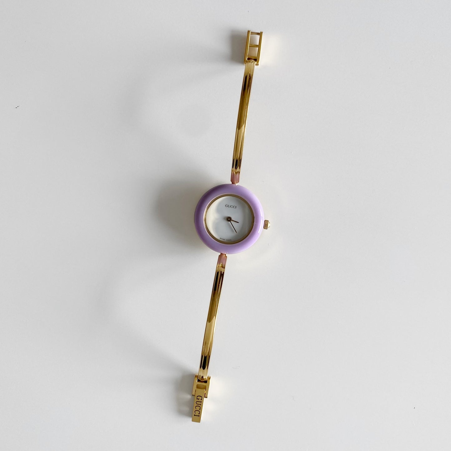 Gucci 1990s Interchangeable Bezel Gold Plated Bangle Watch with 12 bezels, case