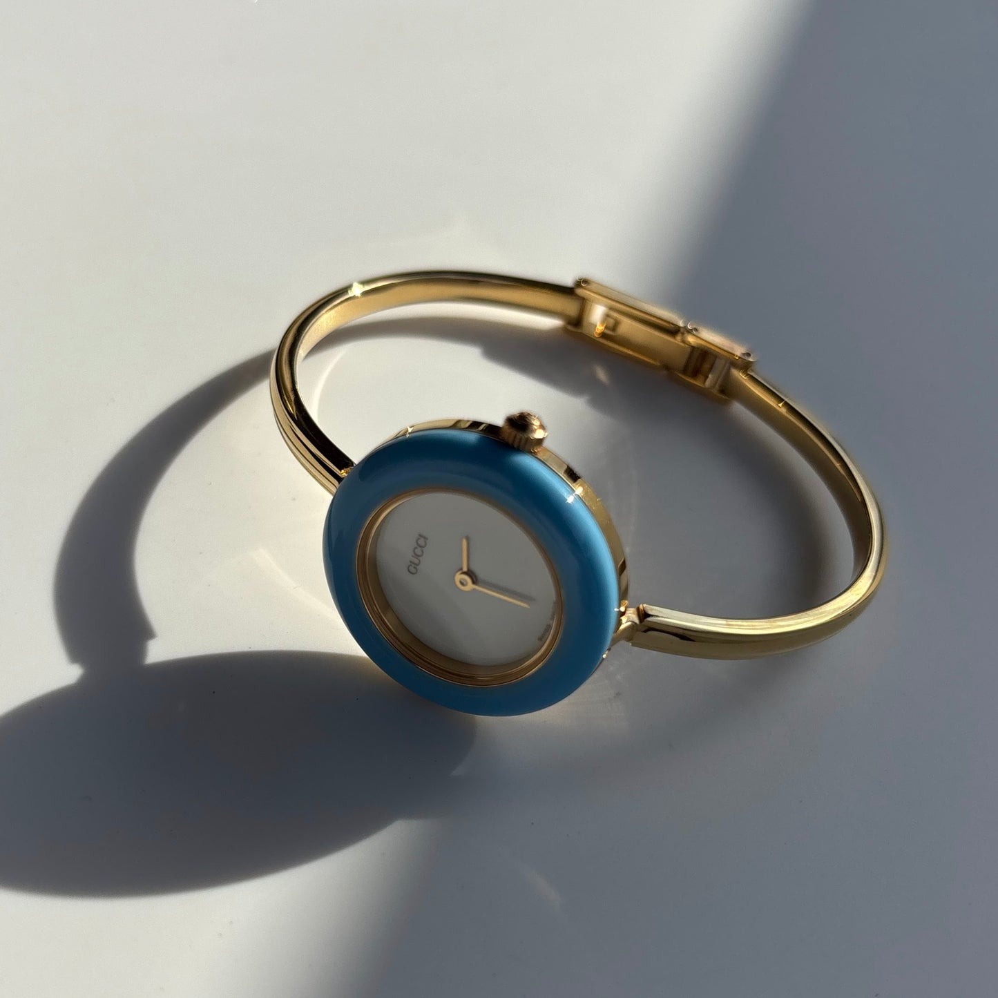 Gucci 1990s Interchangeable Bezel Gold Plated Bangle Watch with 12 bezels, case