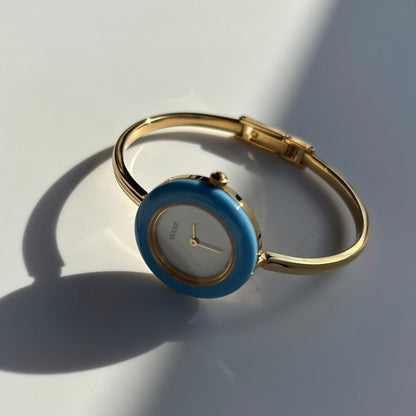 Gucci 1990s Interchangeable Bezel Gold Plated Bangle Watch with 12 bezels, case