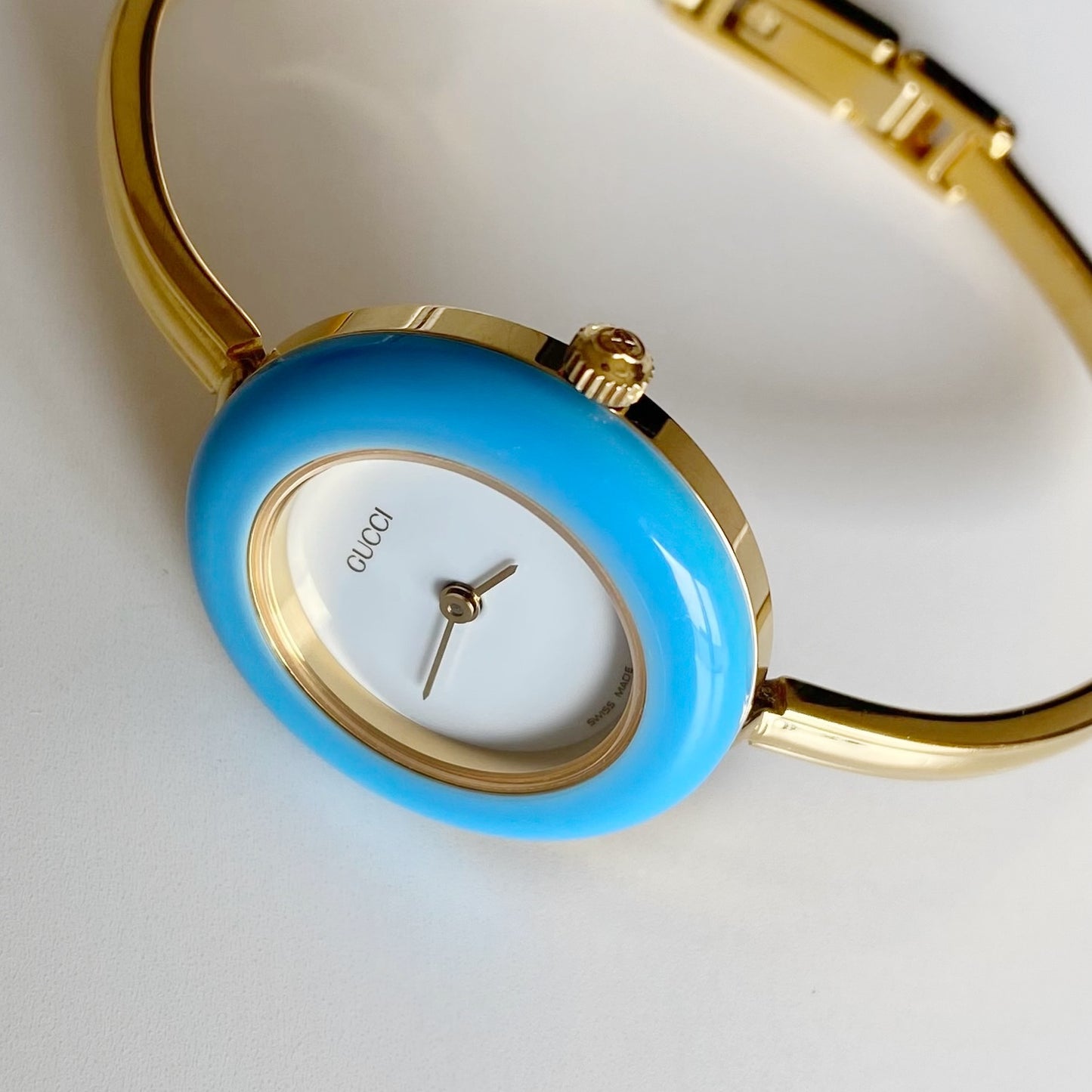 Gucci 1990s Interchangeable Bezel Gold Plated Bangle Watch with 12 bezels, case
