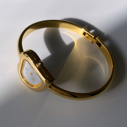 Yves Saint Laurent 1990s Heart Shaped Gold Plated Bangle Watch