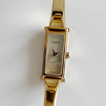 Gucci 1990s Seashell Rectangular Dial Gold Plated Bangle Watch