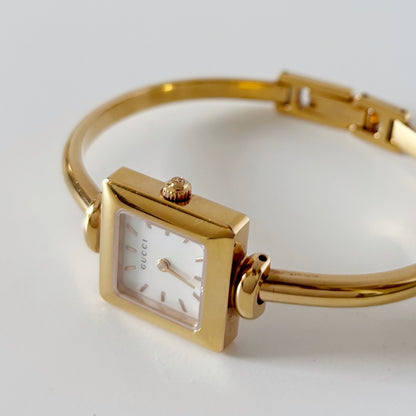 Gucci 1990s Seashell Square Dial Gold Plated Bangle Watch