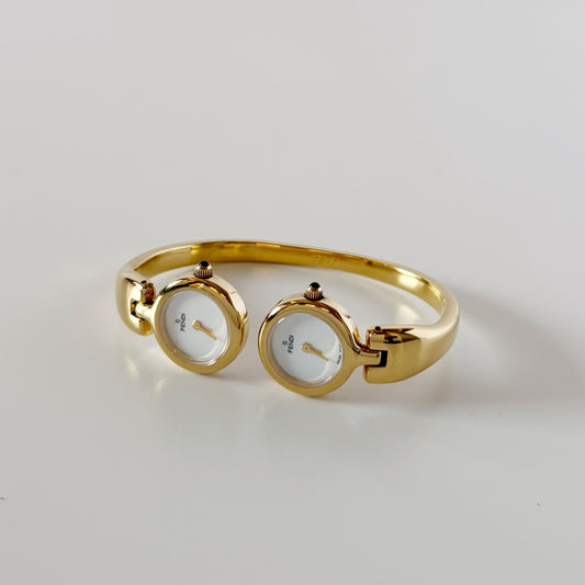 Fendi 1990s Seashell Dial Two Time Zone Gold Plated Bangle Watch (8/29)