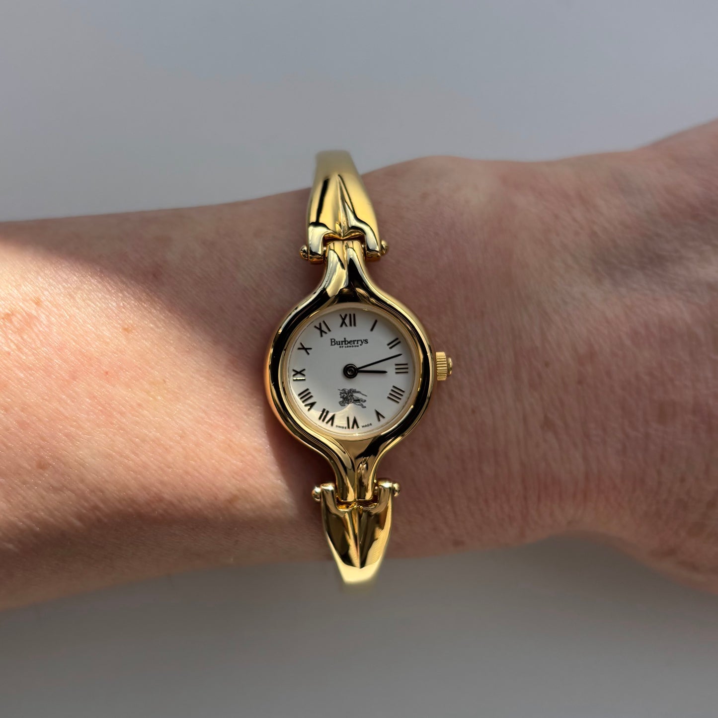 Burberry 1990s Round Dial Gold Plated Bangle Watch