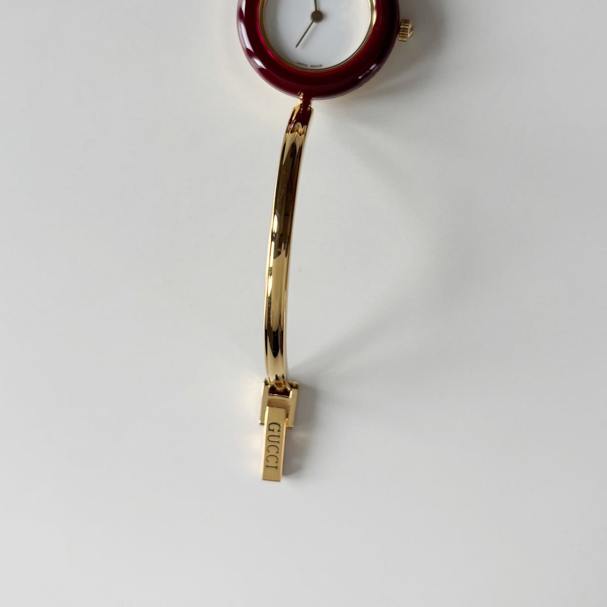 Gucci 1990s Interchangeable Bezel Gold Plated Bangle Watch with 12 bezels, case