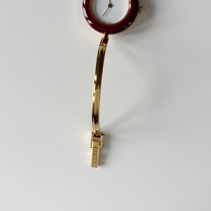 Gucci 1990s Interchangeable Bezel Gold Plated Bangle Watch with 12 bezels, case