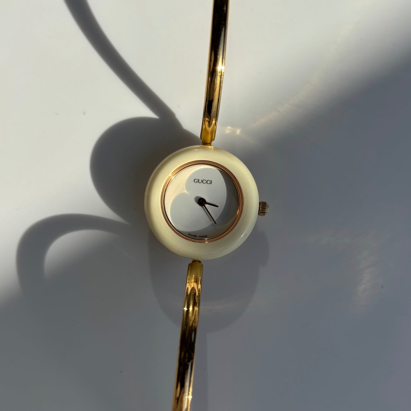 Gucci 1990s Interchangeable Bezel Gold Plated Bangle Watch with 12 bezels, case